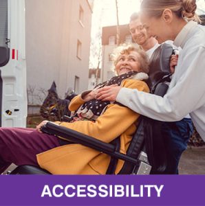Thumbnail photo of two smiling younger people pushing wheelchair with smiling older person onto an accessible bus. Caption is Accessibility